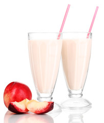 Peach milk shakes isolated on white