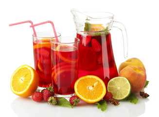 sangria in jar and glasses with fruits, isolated on white