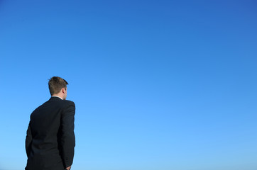 Businessman and blue sky