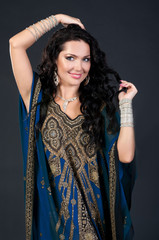 Beautiful young brunette belly dance woman