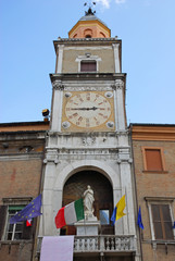 Obraz premium Italy, Modena Piazza Grand clock in the city hall building.