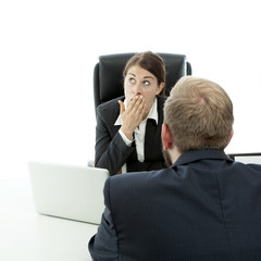 beard business man brunette woman at desk is bored while talk
