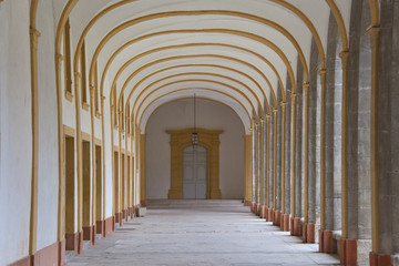 corridor of a cloister in cluny abbey
