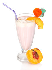 Delicious milk shake with peach isolated on white