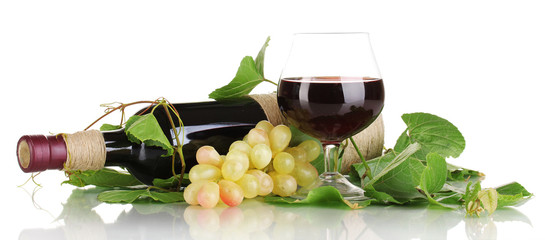 bottle of wine with grape leaves isolated on white