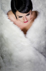 20s style beautiful brunette female wearing fur