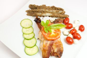 Grilled chicken gourmet with vegetable on white