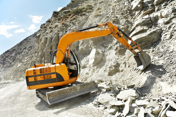 track-type loader excavator at mountain work