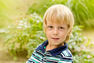 smiling little boy in the park