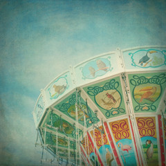 Closeup of a colorful carousel with textured editing
