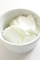 Fototapeta na wymiar white plain Yogurt in white bowl