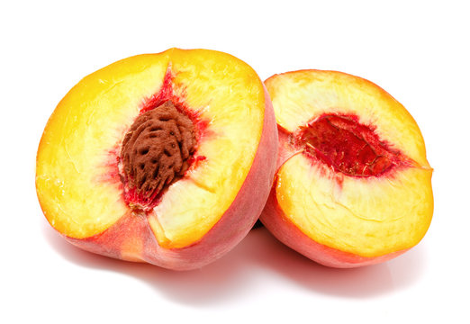 Half of ripe peach isolated