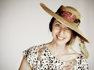 smiling woman with straw hat