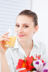Young Woman Drinking Juice