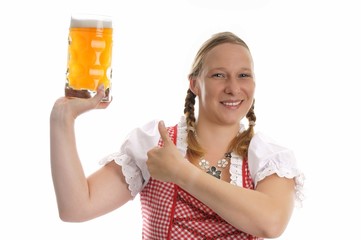 junge hübsche Frau im Dirndl und Maßkrug