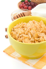 corn flakes with berry isolated on white