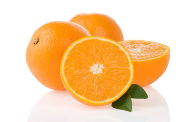 orange fruit and slices isolated on white