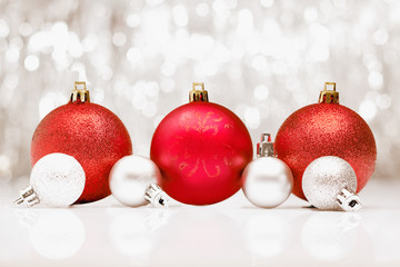 Christmas baubles with bokeh of party llights