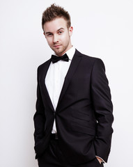 Elegant young handsome man. Studio fashion portrait.