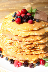 Pancakes with berries and chocolate
