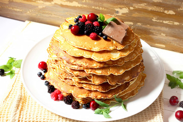 Pancakes with berries and chocolate