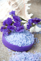 Spa concept. Lavender salt and purple flowers