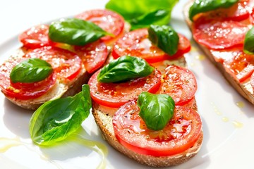 Delicious bread  with tomato and basil
