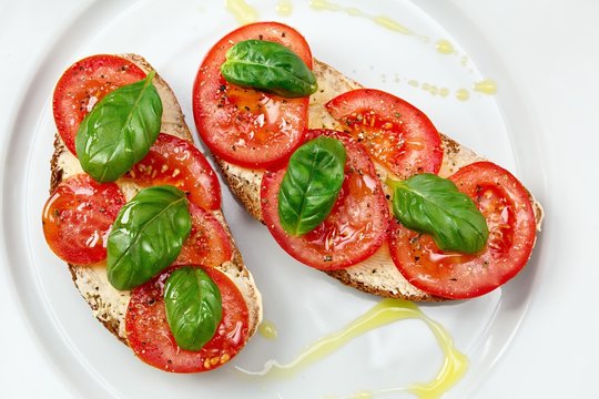 Delicious bread  with tomato and basil