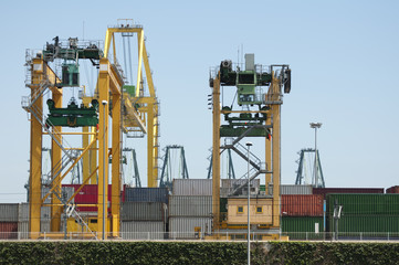 Fototapeta na wymiar Working crane bridge in shipyard at dusk for Logistic Import Exp