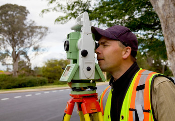 Surveyor checks his work