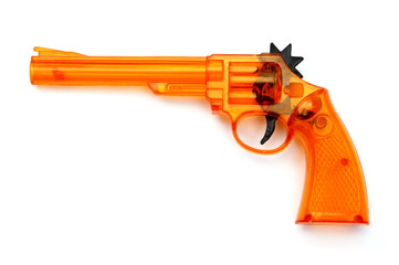 Toy plastic gun , on a white background
