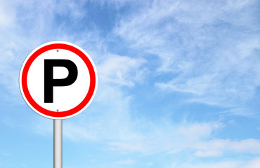 Parking sign over blue sky