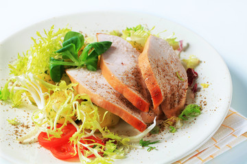 Roast turkey breast and potatoes