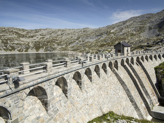 Dam in the alpine lake