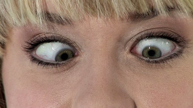 HD1080i Young womans eyes. Crazy and just for fun.
