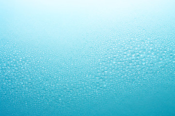 Small water drops arranging in the form of wave.