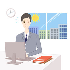 デスクワークをする男性