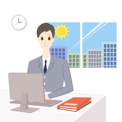 デスクワークをする男性