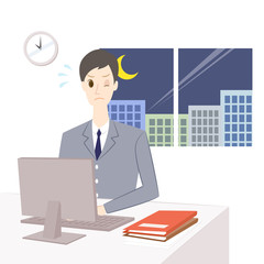 残業をする男性