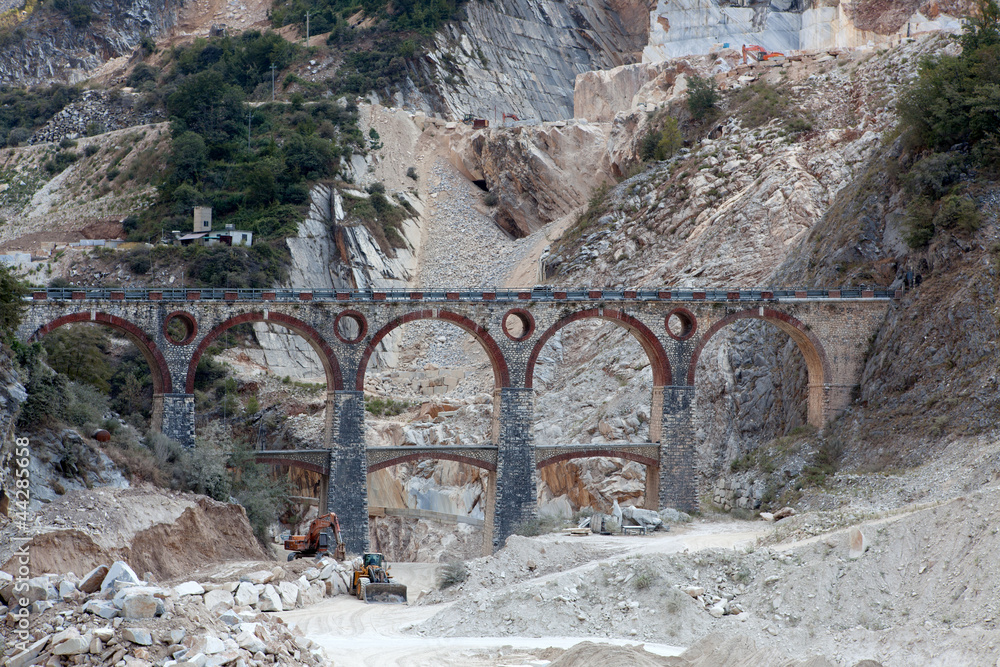 Wall mural white marble quarry, bridge and excavators. apuan, carrara, tusc