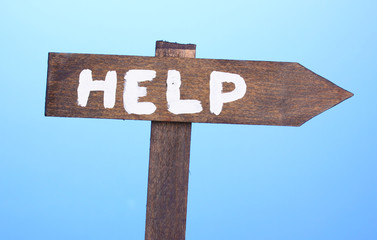 Help wooden board on blue background