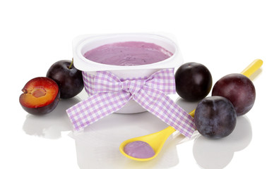 Yogurt with blueberries and plums isolated on white