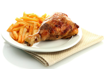 Roast chicken with french fries on plate, isolated on white