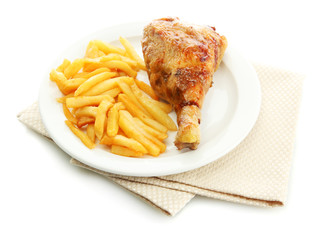 Roast chicken with french fries on plate, isolated on white