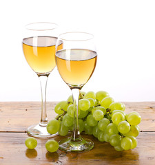 racemation and glass with  liquid on wood