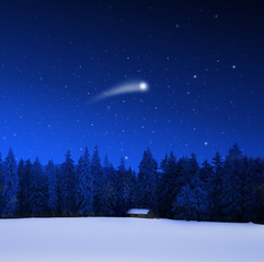 Verschneite Schihütte und Weihnachtsstern
