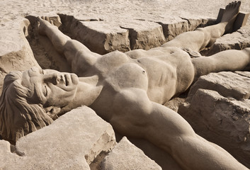 Adam sand sculpture at Las Palmas beach - obrazy, fototapety, plakaty
