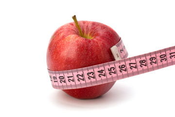 Apple with tape measure. Healthy lifestyle concept.