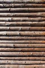 Wooden logs wall of rural house