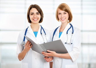 Portrait of two successful female doctors